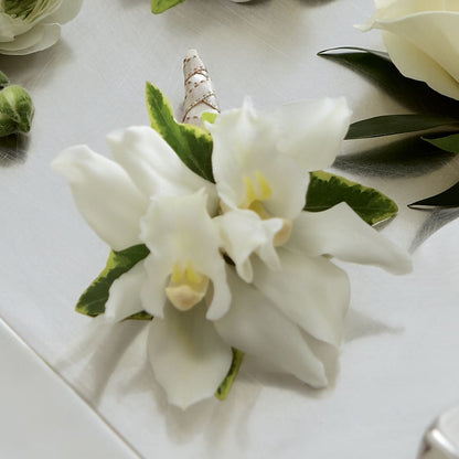 White Mini Cymbidium Boutonniere –  Greater Kansas City Flower Shop, Kansas City MO